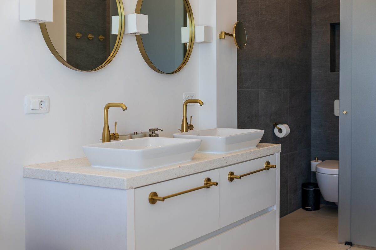 Side view of master bathroom dual Villeroy and Boch vanity at The Beachhouse Rogoznica