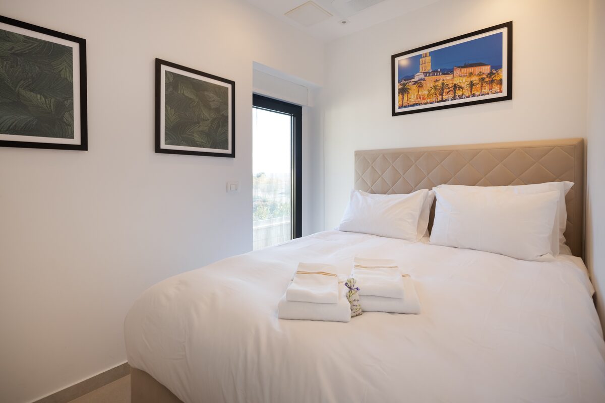 Second double bedroom with framed Split bell tower photograph, The Beachhouse Rogoznica