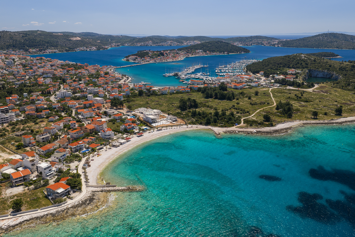 Aerial view of Rogoznica with The Beachhouse on the bay