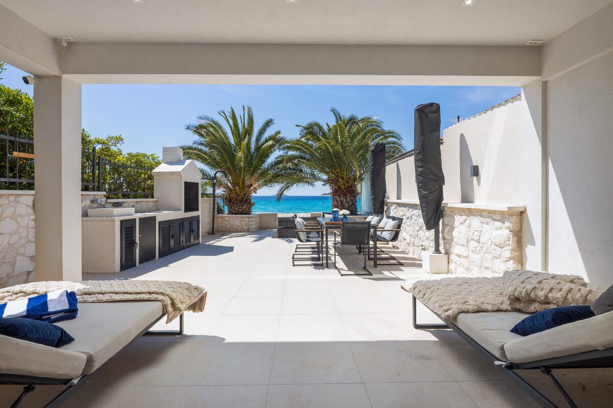 Terrace lounge area in afternoon light, The Beachhouse Rogoznica