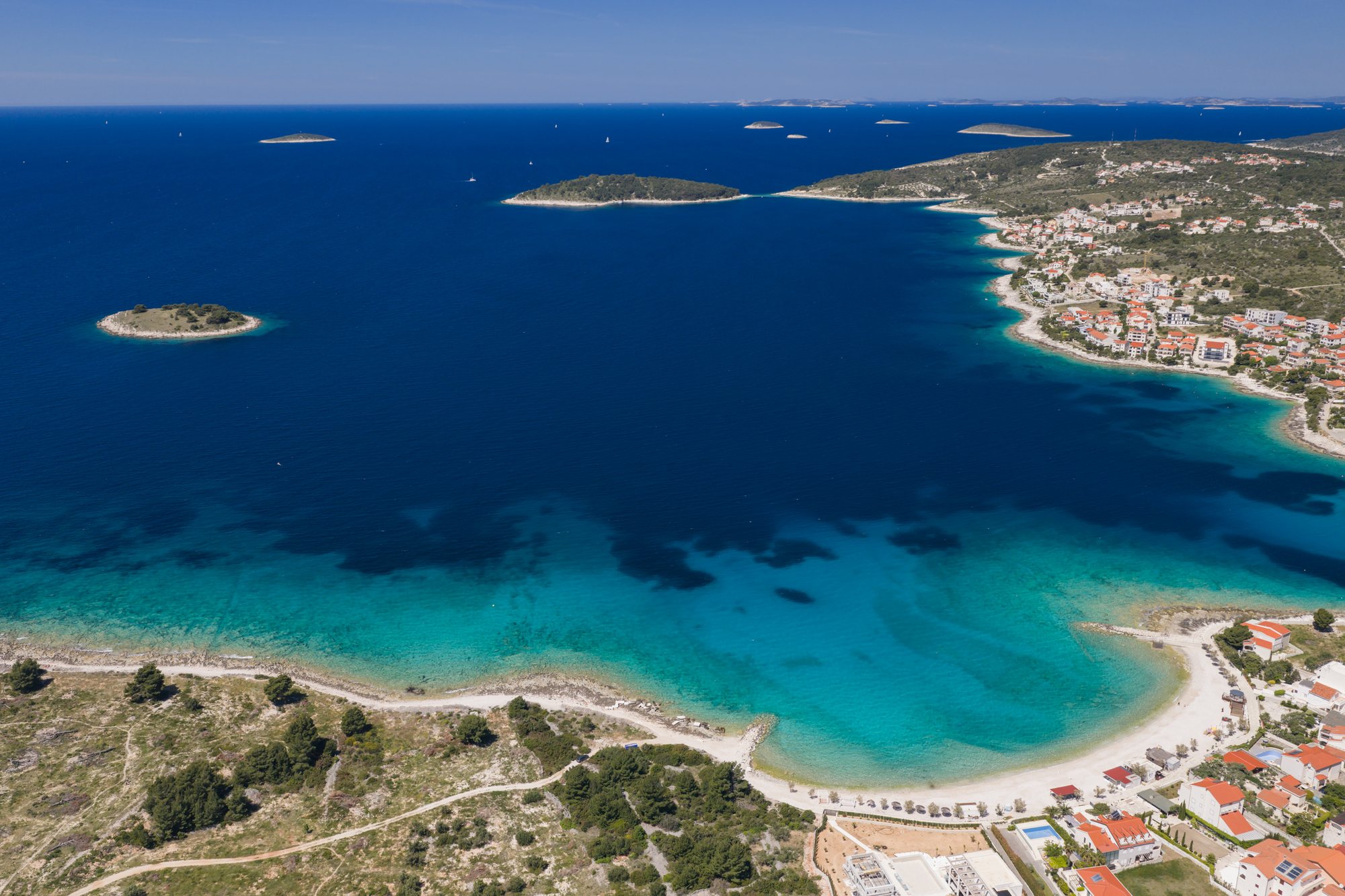 Aerial drone view of Rogoznica bay with The Beachhouse luxury beachfront villa Croatia
