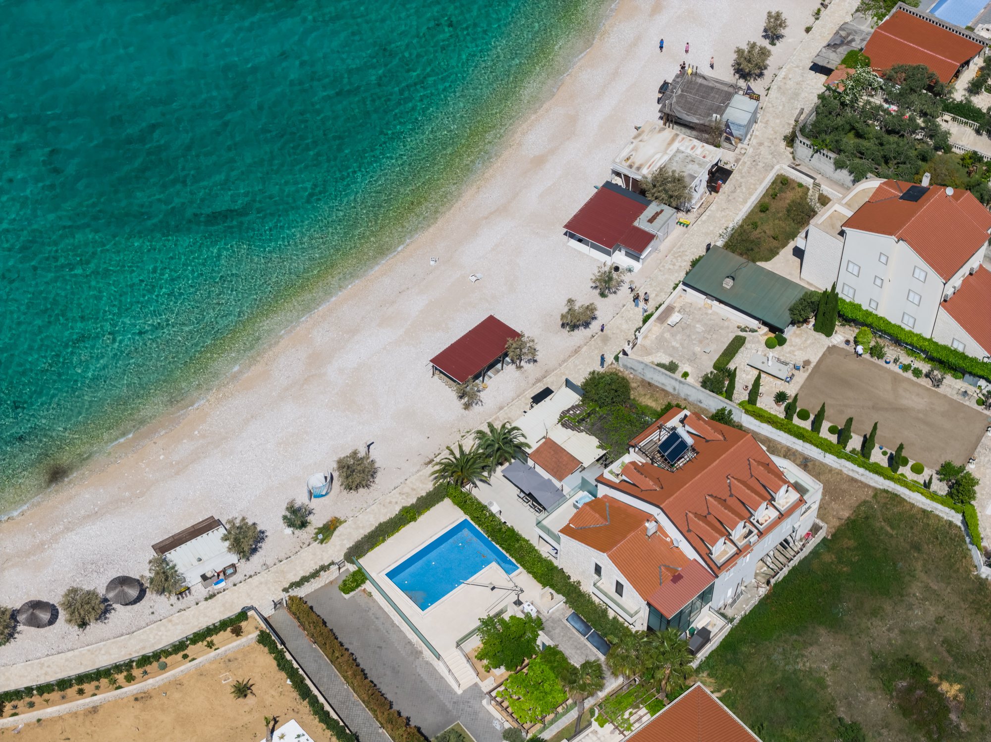 Aerial drone view of Rogoznica Croatia coast at The Beachhouse luxury beachfront villa