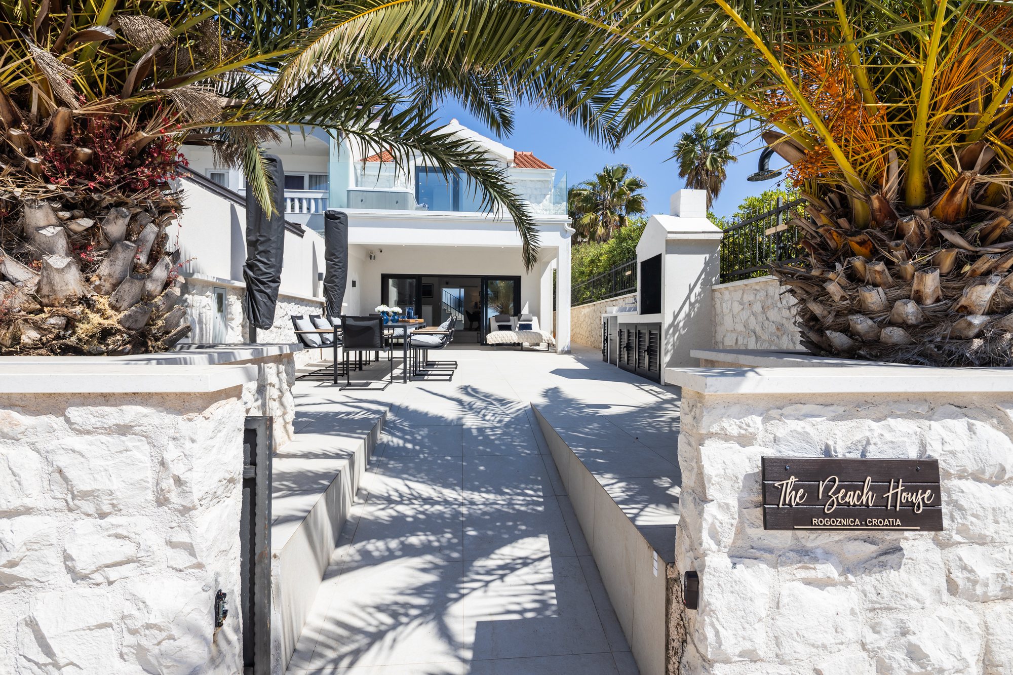 Exterior of The Beachhouse Rogoznica luxury beachfront villa Croatia, approach to the entrance