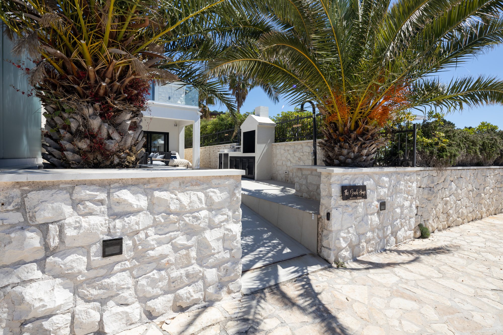 Exterior of The Beachhouse Rogoznica luxury beachfront villa Croatia, approach to the entrance