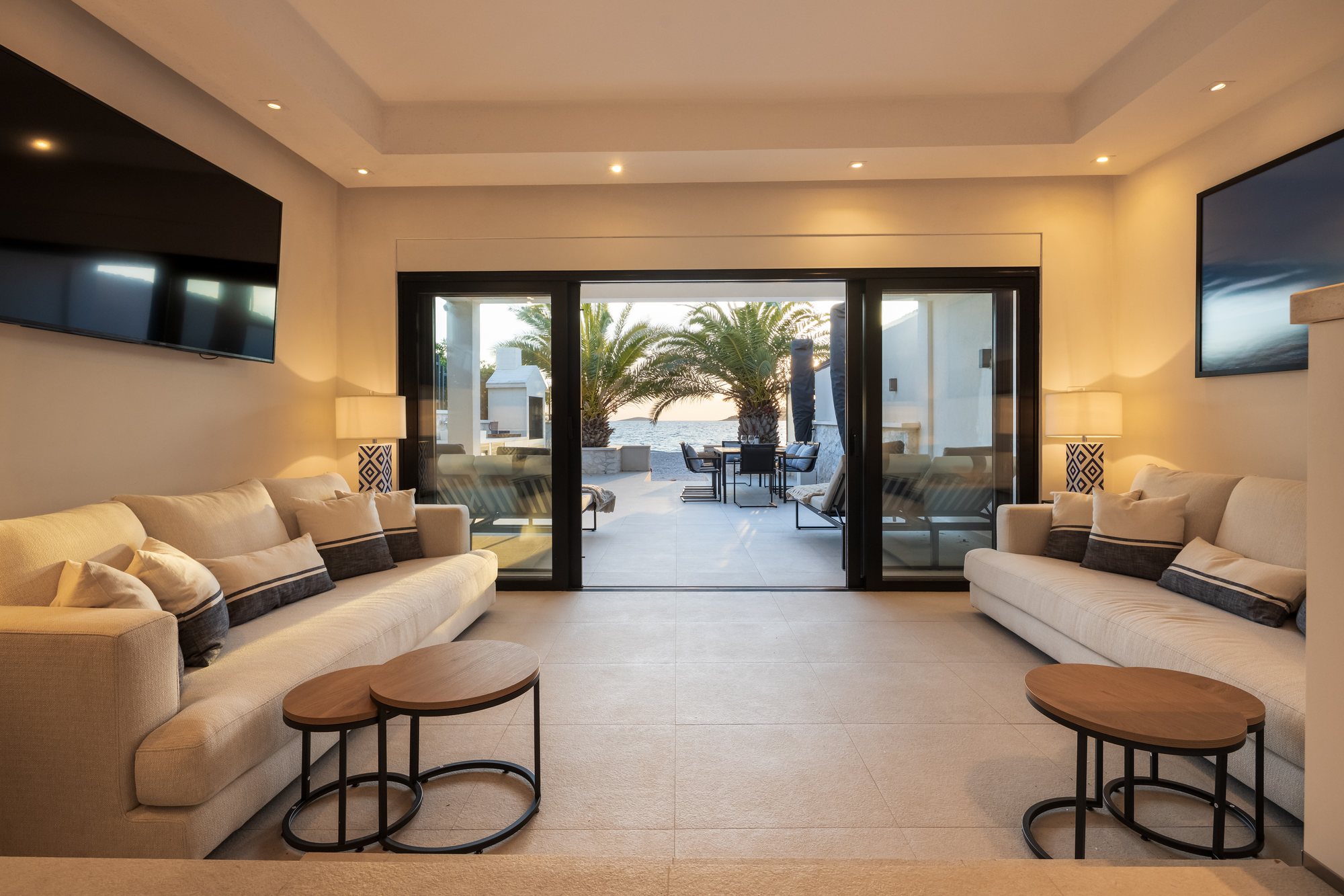 Living room, kitchen and dining at The Beachhouse Rogoznica luxury beachfront villa Croatia